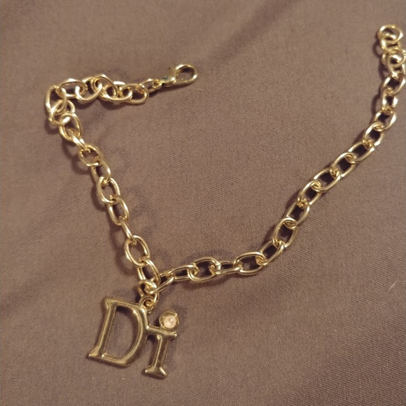 Diamonds International charm bracelet in gold tone - Picture 2 of 4